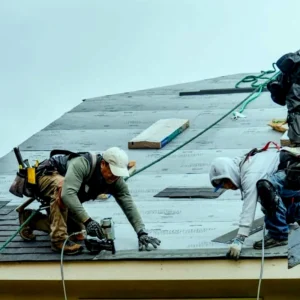 Restoration technician checking ceiling moisture levels for ceiling leak repair Lakeland FL after an HVAC drain line leak.